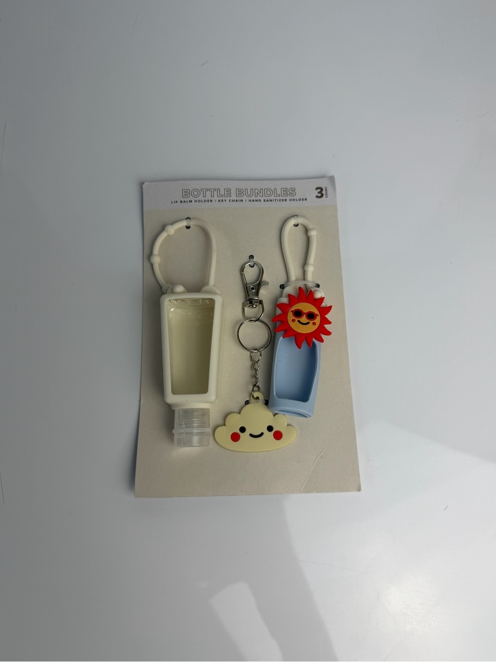 3-Piece Lip Balm & Hand Sanitizer Holder Bundle with Cloud Keychain
